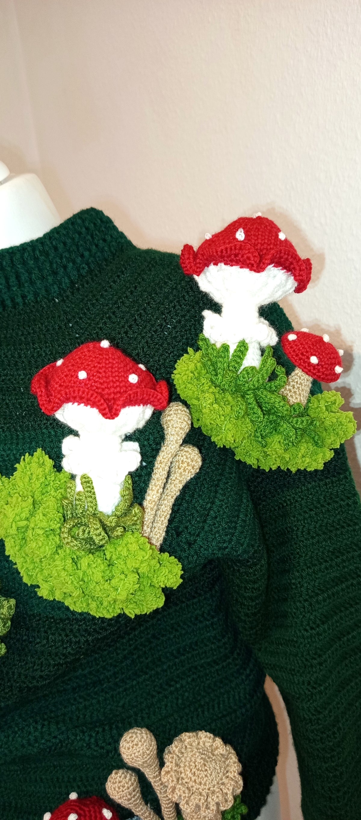 Crocheted sweater with 3D mushrooms