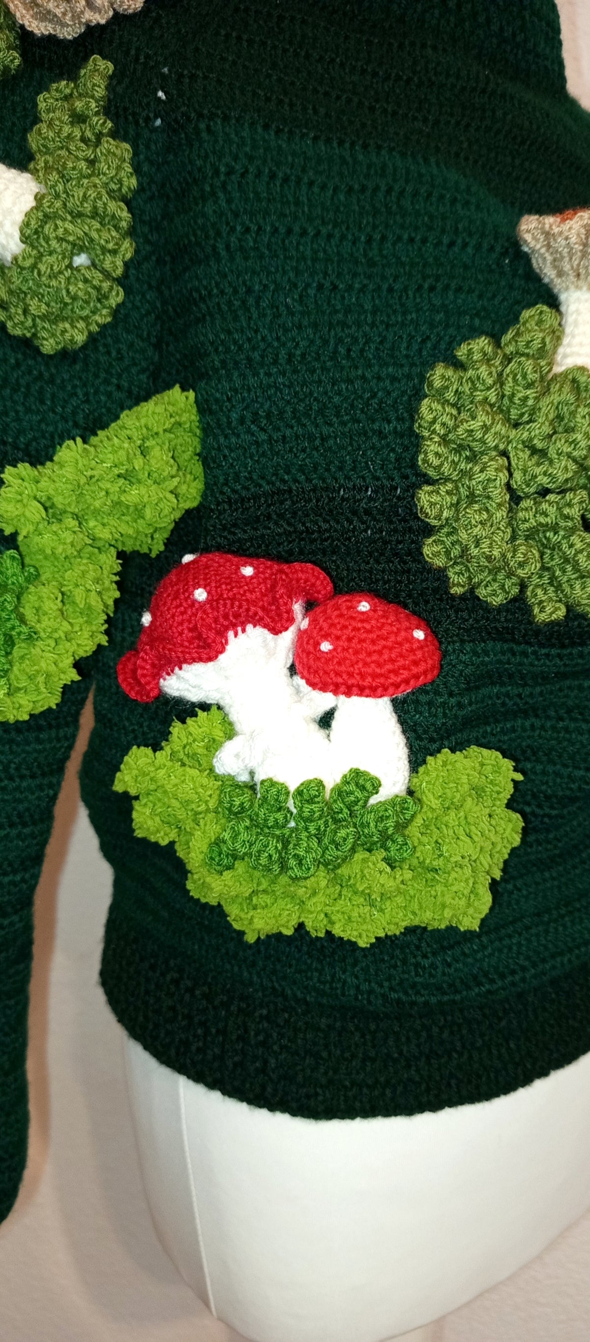 Crocheted sweater with 3D mushrooms